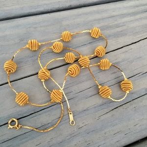 Chain with gold balls is not marked